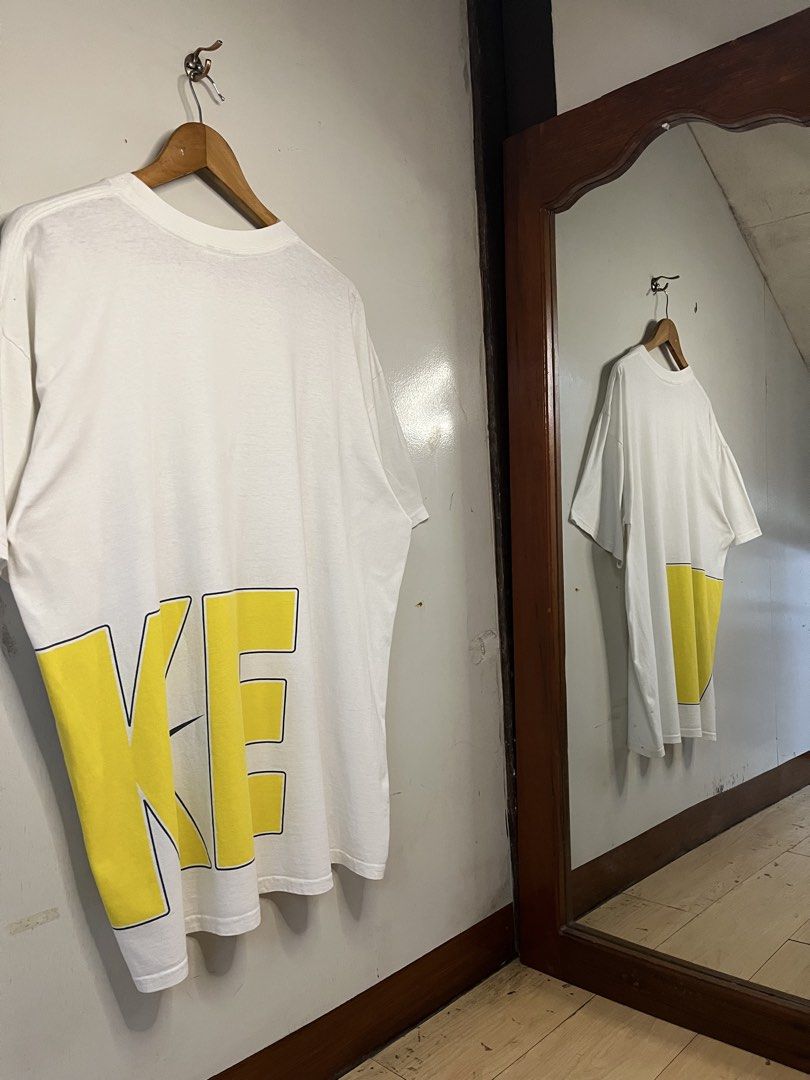 90s Nike Tee (Category: Tshirts & Polo Shirts ) located in Baguio. Submitted by ezrab. (Listing ID 1465499399, Image 2). Description: 90s Nike Wrap Around Tee 25*30 Issues: Stains .