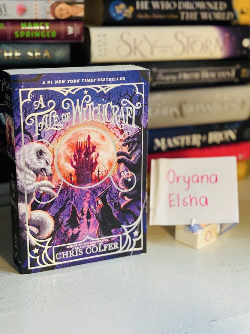A Tale of Witchcraft by Chris Colfer (Category: Storybooks) located in Manila. Submitted by yanastash (Listing ID 1465532380, Image 1). Description: - Title: A Tale of Witchcraft by Chris Colfer - Edition: Hardcover with purple and gold illustrated dust jacket - Status: #1 New York Times Bestseller & sequel to A Tale of Magic - Condition: Clean pages and sharp corners, excellent read for fantasy fans.