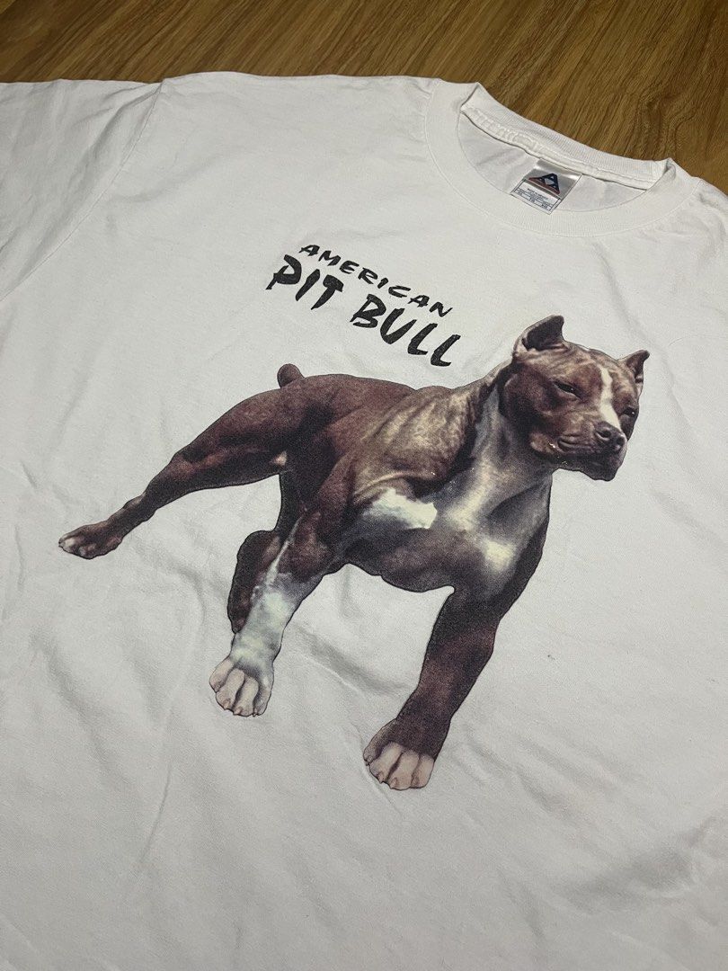 AAA American Pit Bull XL •23x21 (Category: Tshirts & Polo Shirts ) located in Cebu City. Submitted by guttathreads (Listing ID 1465429789, Image 2). Description: - Brand: Alstyle Apparel & Activewear - Design: Detailed American Pit Bull graphic with bold lettering on the chest - Color: Clean white - Size: XL - Origin: Made in Mexico - Style: Standard short sleeve crewneck.