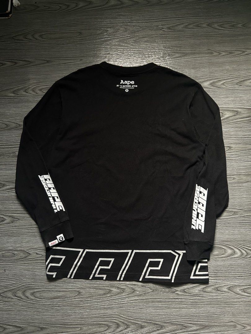 Aape Universe Graphic Longsleeve (Category: Tshirts & Polo Shirts ) located in Dasmarinas. Submitted by zn_upcldtrs (Listing ID 1465436477, Image 2). Description: Aape Universe Graphic Longsleeve - 22 W / 29 L - As New Condition - Authentic .
