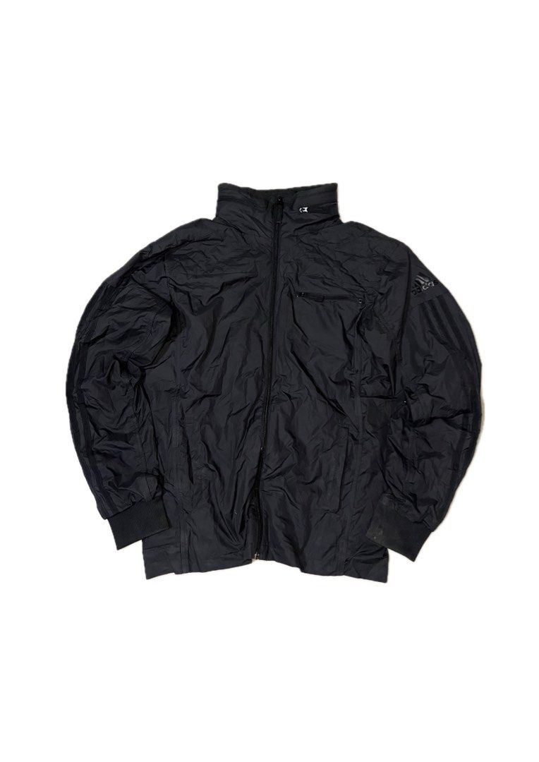 Adidas Black Quilted Zip Jacket with Hood (Category: Coats, Jackets and Outerwear) located in Manila. Submitted by kukolmarc (Listing ID 1465432373, Image 1). Description: - Brand: Adidas - Color: Black - Condition: Excellent / Pre-loved - Design: Quilted outer shell with subtle sleeve stripes and printed logo - Comfort & Warmth: Built-in hood with fleece-lined collar and orange mesh interior - Pockets: Convenient zipper pockets on both chest and