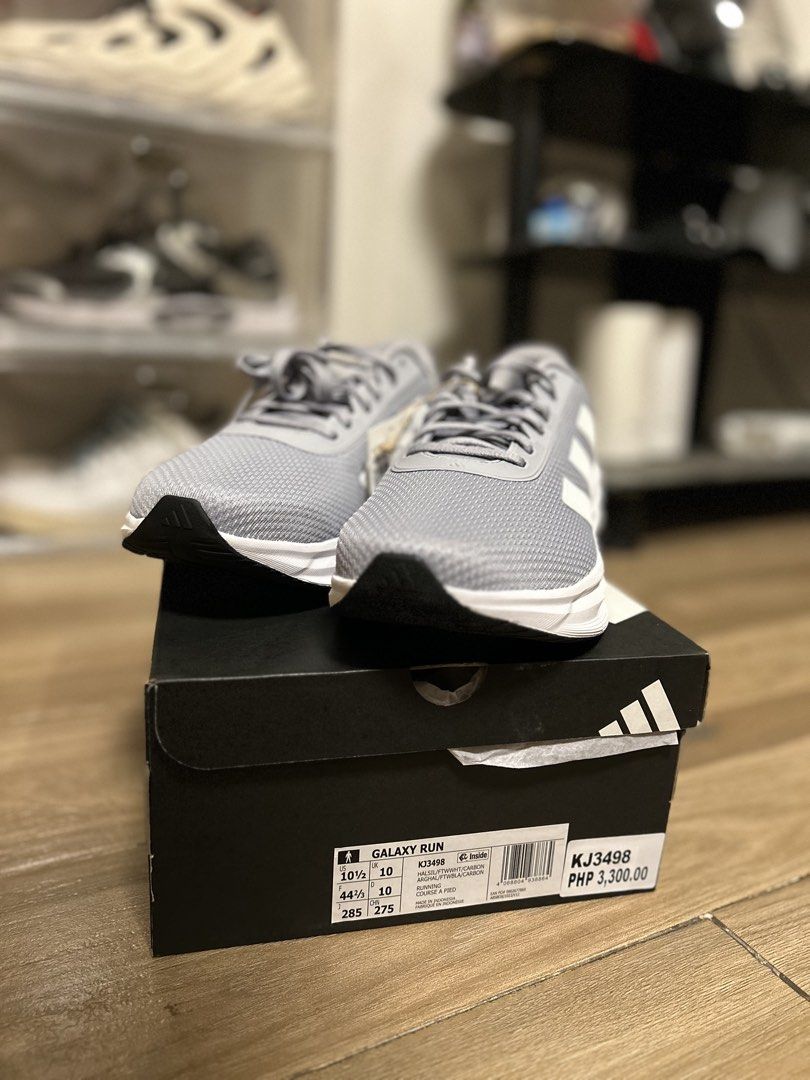 Adidas Galaxy Run (Gray) (Category: Casual Shoes) located in Malabon City. Submitted by chaasingman420 (Listing ID 1465503799, Image 1). Description: - Brand: Adidas - Model: Galaxy Run - Color: Gray with white stripes - Size: US 10.5 Men's (EU 44 2/3 / UK 10) - Condition: Brand new with original box and tags - Features: Lightweight, breathable mesh upper, and comfortable cushioning - Ideal for: Running, workouts, pickleball or everyday casual st