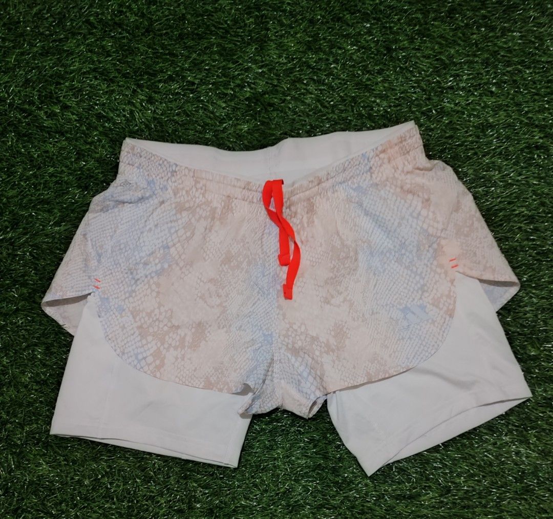 Adidas Run Fast 2 in 1 shorts (Category: Activewear) located in Cebu City. Submitted by deadjay84 (Listing ID 1465494919, Image 1). Description: Adidas Run Fast 2 in 1 shorts - Size medium fits 28-30 - Like new condition - Waist: Bright orange adjustable drawstring - Storage: Convenient back zipper pocket for keys or cards - Safety: Reflective strips on back legs for night visibility - Material: Breathable, high-performance athletic fabric - pls 