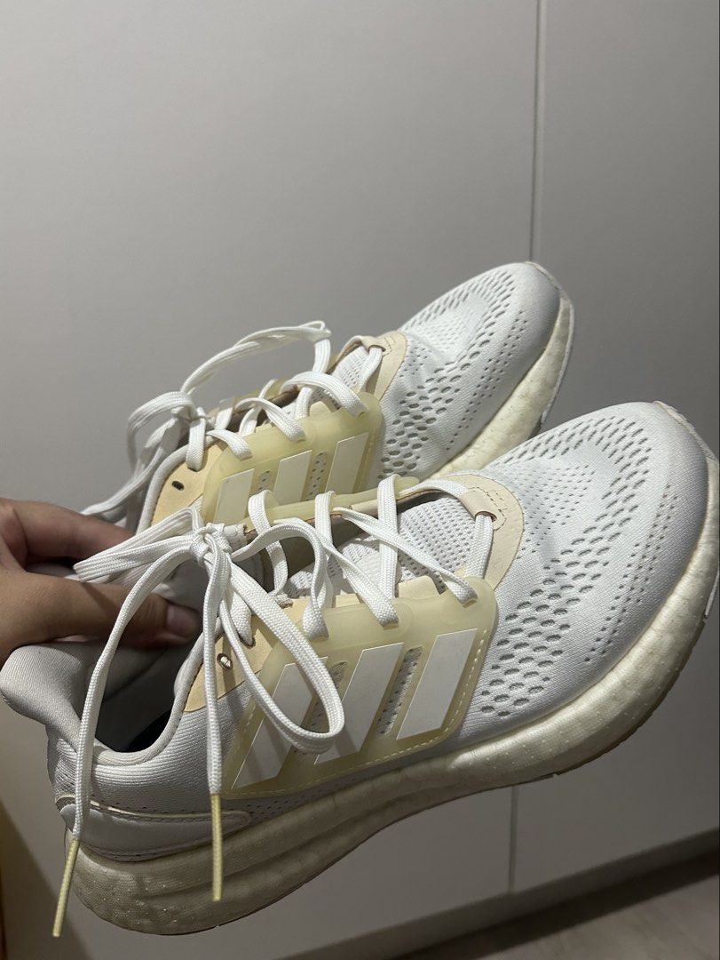 Adidas running shoes white size US 8 (Category: Sneakers) located in Quezon City. Submitted by random_00001 (Listing ID 1465514516, Image 1). Description: - original - Only worn around 3–4 times - Stored for a while, which caused some yellowing - Good for running - Reason for selling: Slightly too big for me.
