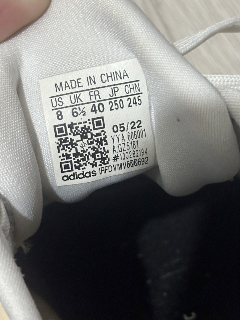 Adidas running shoes white size US 8 (Category: Sneakers) located in Quezon City. Submitted by random_00001 (Listing ID 1465514516, Image 2). Description: - original - Only worn around 3–4 times - Stored for a while, which caused some yellowing - Good for running - Reason for selling: Slightly too big for me.
