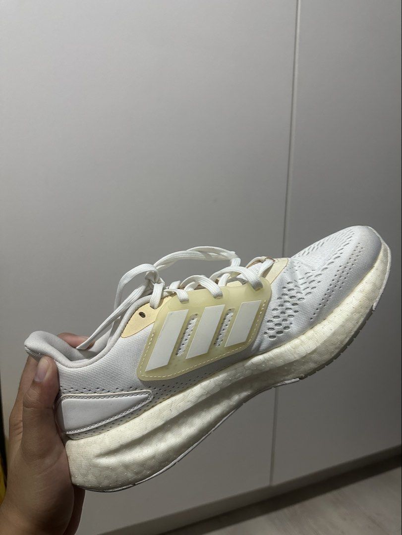 Adidas running shoes white size US 8 (Category: Sneakers) located in Quezon City. Submitted by random_00001 (Listing ID 1465514516, Image 3). Description: - original - Only worn around 3–4 times - Stored for a while, which caused some yellowing - Good for running - Reason for selling: Slightly too big for me.
