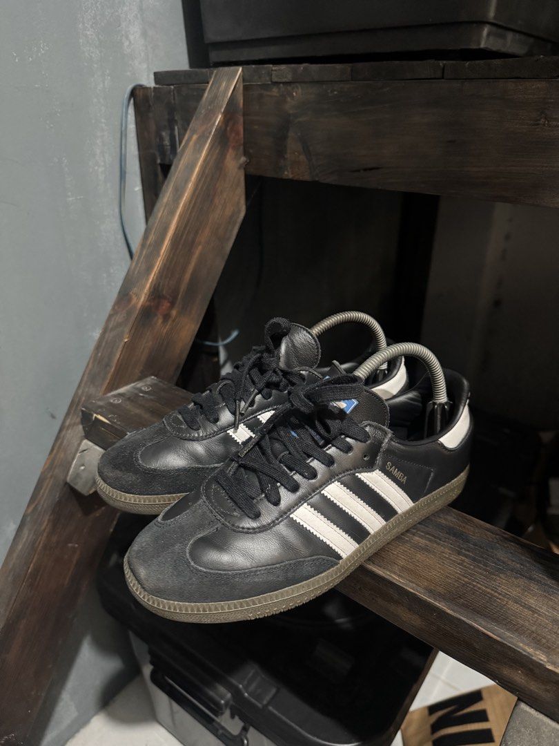 Adidas Samba Black White Sneakers (Category: Sneakers) located in Manila. Submitted by JustinsCloset (Listing ID 1465439618, Image 1). Description: - Brand: Adidas Samba - Color: Black and white with gum soles and blue tongue label - Size: US 6.5 / UK 6 - Material: Leather upper with suede toe overlays - Condition: Great everyday casual kicks, plenty of tread and life remaining - No box - Authentic - price nego.