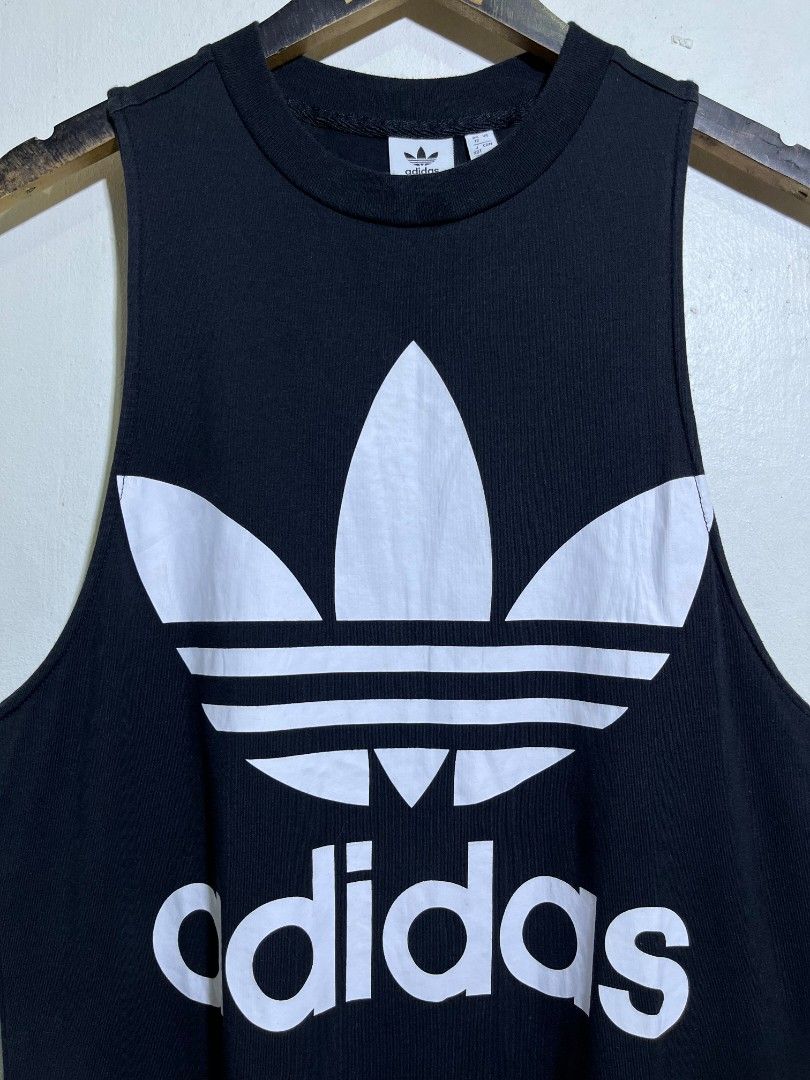 ADIDAS TANK TOP (Category: Tshirts & Polo Shirts ) located in Dumaguete. Submitted by kingepoy (Listing ID 1465417575, Image 3). Description: Small - Medium Width 18.5 / Length 28 Excellent Condition 9.8/10 Color Rate No issues.