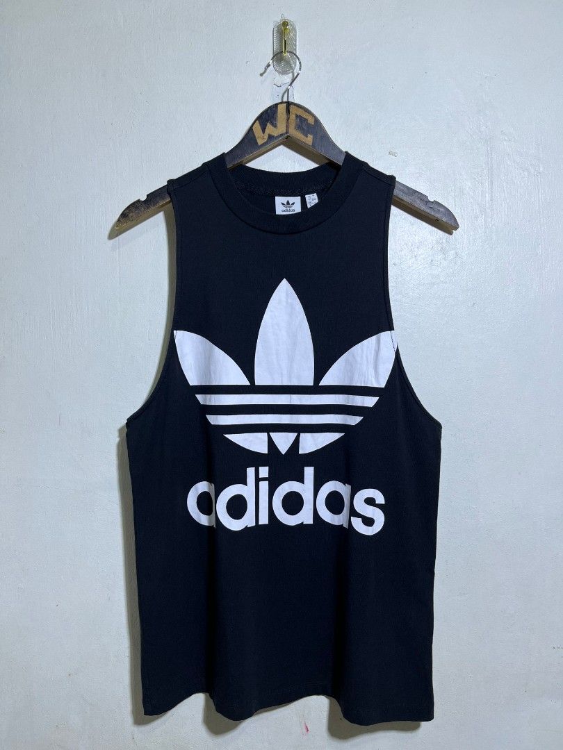 ADIDAS TANK TOP (Category: Tshirts & Polo Shirts ) located in Dumaguete. Submitted by kingepoy (Listing ID 1465417575, Image 1). Description: Small - Medium Width 18.5 / Length 28 Excellent Condition 9.8/10 Color Rate No issues.