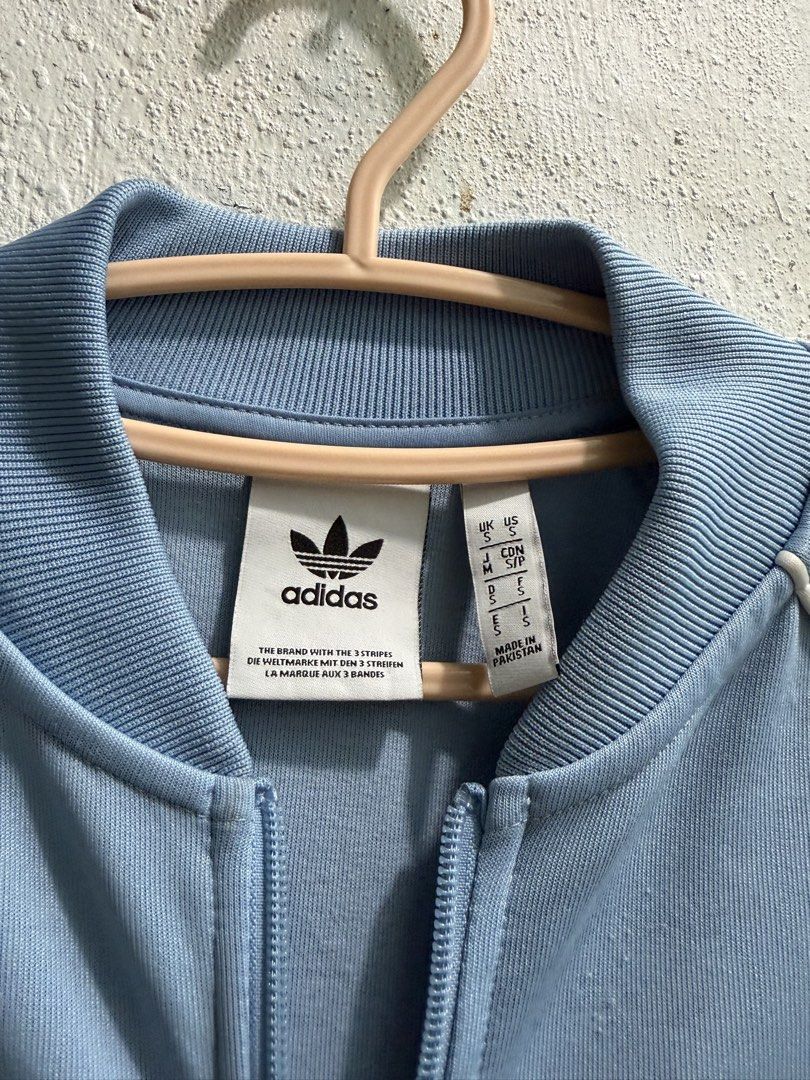 Adidas track jacket (Category: Coats, Jackets and Outerwear) located in Manila. Submitted by ruel1104 (Listing ID 1465432334, Image 2). Description: Like new po no issue Pm na lang sa ibang details.