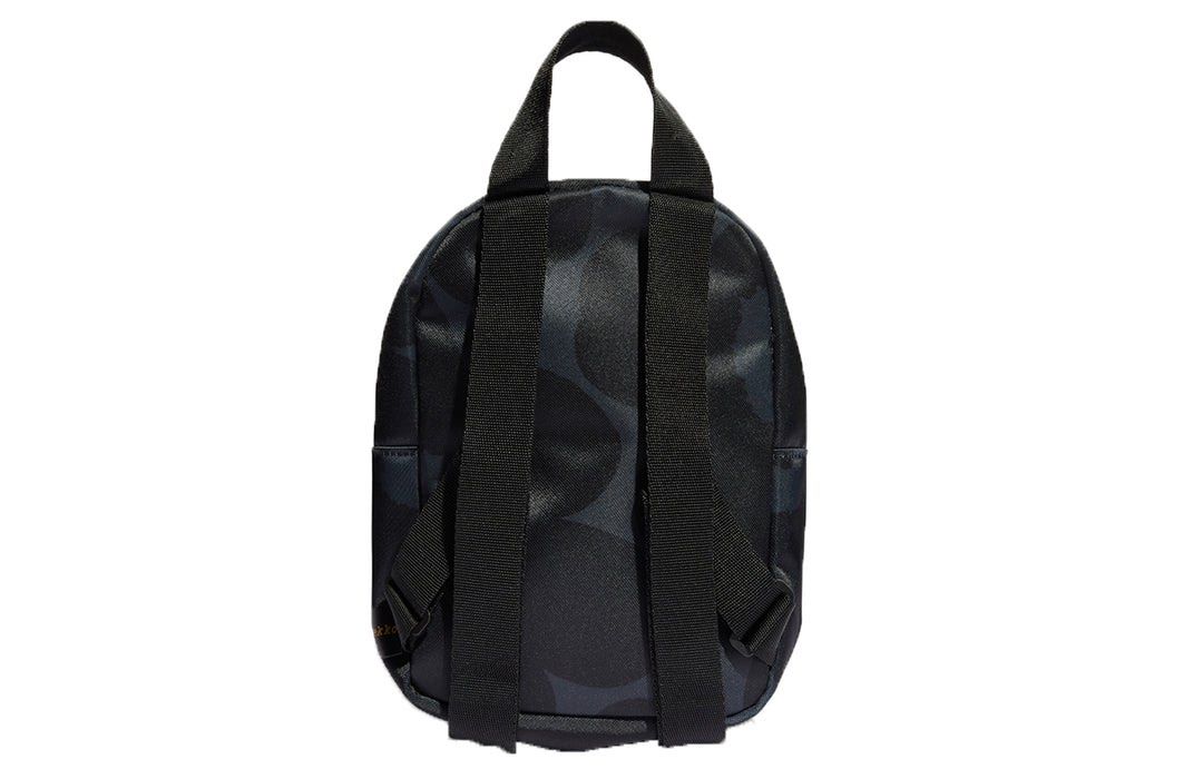 Adidas x Marimekko Mini Backpack Black Gold (Category: Backpacks) located in Pasig City. Submitted by nakamuraka (Listing ID 1465397739, Image 3). Description: Adidas and Marimekko collaboration mini backpack. Black colorway featuring the iconic poppy print pattern throughout. Gold foil trefoil logo on the front pocket and branding tag on the side. Front zippered pouch pocket, main zip compartment, and adjustable shoulder straps. Compact size, gr