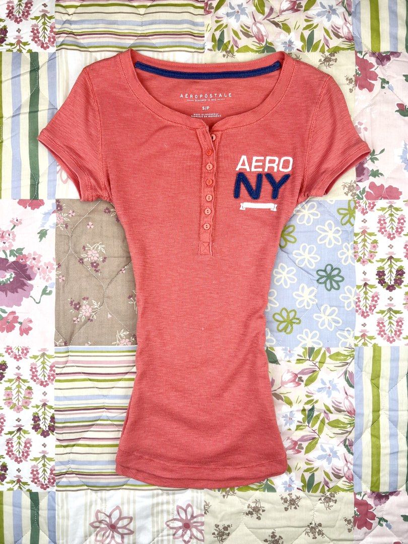 Aeropostale Henley Top (Category: Shirts) located in Angeles City. Submitted by fruits.ph (Listing ID 1465423690, Image 1). Description: Measurements B:13.5” W:11.5” L:23.5” Size on Tag: S Best Fit: S-M *Flat lay measurements* Mannequin Size: M (34”; 25”) Color Rate: 10/10 Flaws: 3 small bleach stain fairly noticeable (See photos attached) Fabric Type: Cotton/ Stretchable Fabric ***Color may vary due to lighting. This item is properly washed and 