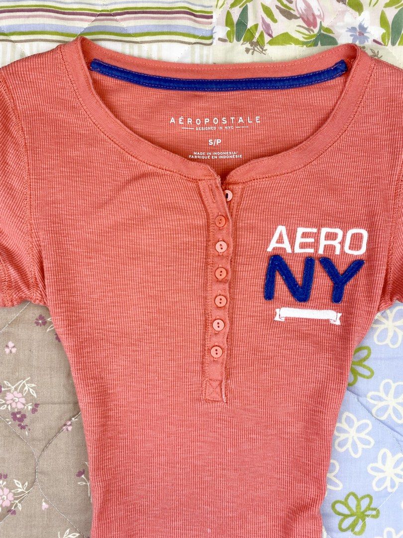 Aeropostale Henley Top (Category: Shirts) located in Angeles City. Submitted by fruits.ph (Listing ID 1465423690, Image 3). Description: Measurements B:13.5” W:11.5” L:23.5” Size on Tag: S Best Fit: S-M *Flat lay measurements* Mannequin Size: M (34”; 25”) Color Rate: 10/10 Flaws: 3 small bleach stain fairly noticeable (See photos attached) Fabric Type: Cotton/ Stretchable Fabric ***Color may vary due to lighting. This item is properly washed and 