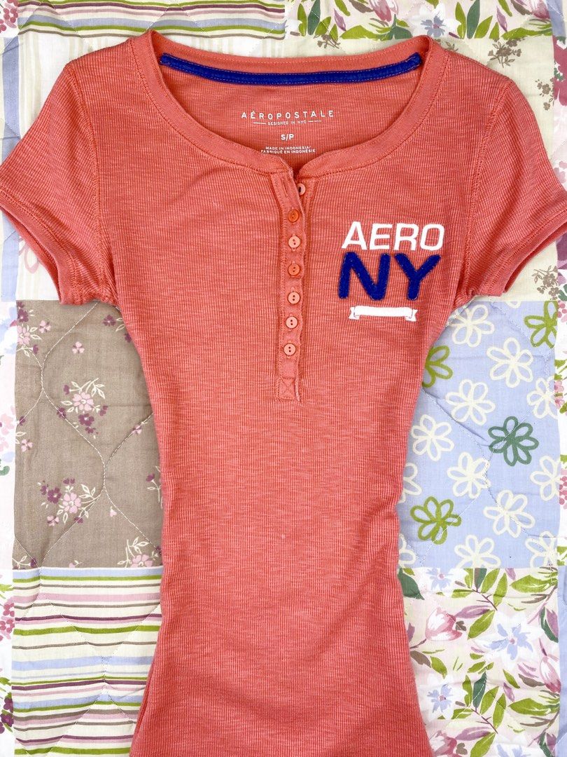 Aeropostale Henley Top (Category: Shirts) located in Angeles City. Submitted by fruits.ph (Listing ID 1465423690, Image 2). Description: Measurements B:13.5” W:11.5” L:23.5” Size on Tag: S Best Fit: S-M *Flat lay measurements* Mannequin Size: M (34”; 25”) Color Rate: 10/10 Flaws: 3 small bleach stain fairly noticeable (See photos attached) Fabric Type: Cotton/ Stretchable Fabric ***Color may vary due to lighting. This item is properly washed and 