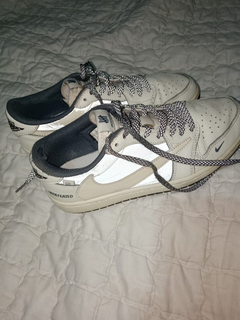 Air Jordan 1 Low Undefeated Custom (Category: Sneakers) located in Allen. Submitted by milyonaryung_gipit (Listing ID 1465395072, Image 1). Description: - Custom Air Jordan 1 Low in a clean cream and white colorway - Eye-catching reflective side panels and matching reflective patterned laces - UNDEFEATED branding printed near the heel and stitched on the tongue tag - Subtle mini Nike swoosh detail on the outer toe box - Finished with an off-white