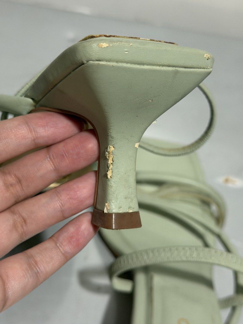 ALDO Sage Green Square Toe Heels Size 38 (Category: Heels) located in Santa Rosa. Submitted by leana_yna (Listing ID 1465486633, Image 3). Description: - Brand: ALDO - Style: Sage green mules with clear toe straps and square toe - Heel: Kitten heel - Size: US 7.5 / EUR 38 / UK 5 - Condition: Normal wear on soles; minor peeling and scuffing on the heel wrap as shown in photos.