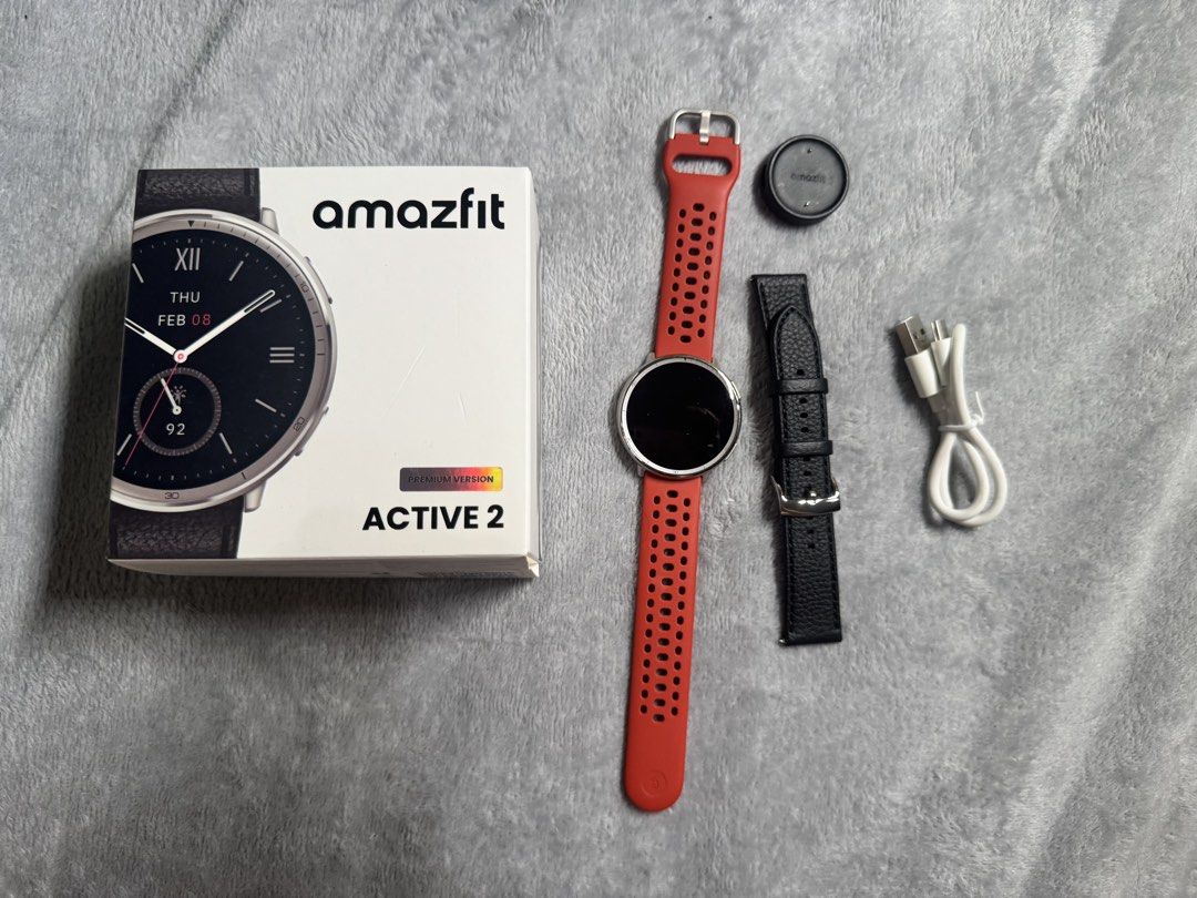 Amazfit Active 2 Premium Version (Category: Wearables & Smart Watches) located in Pasig City. Submitted by pattypotato_ (Listing ID 1465533410, Image 2). Description: Amazfit Active 2 Watch Premium Version Unused original leather strap and unused original orange strap Extremely good condition, no scratches/dents and no issues .