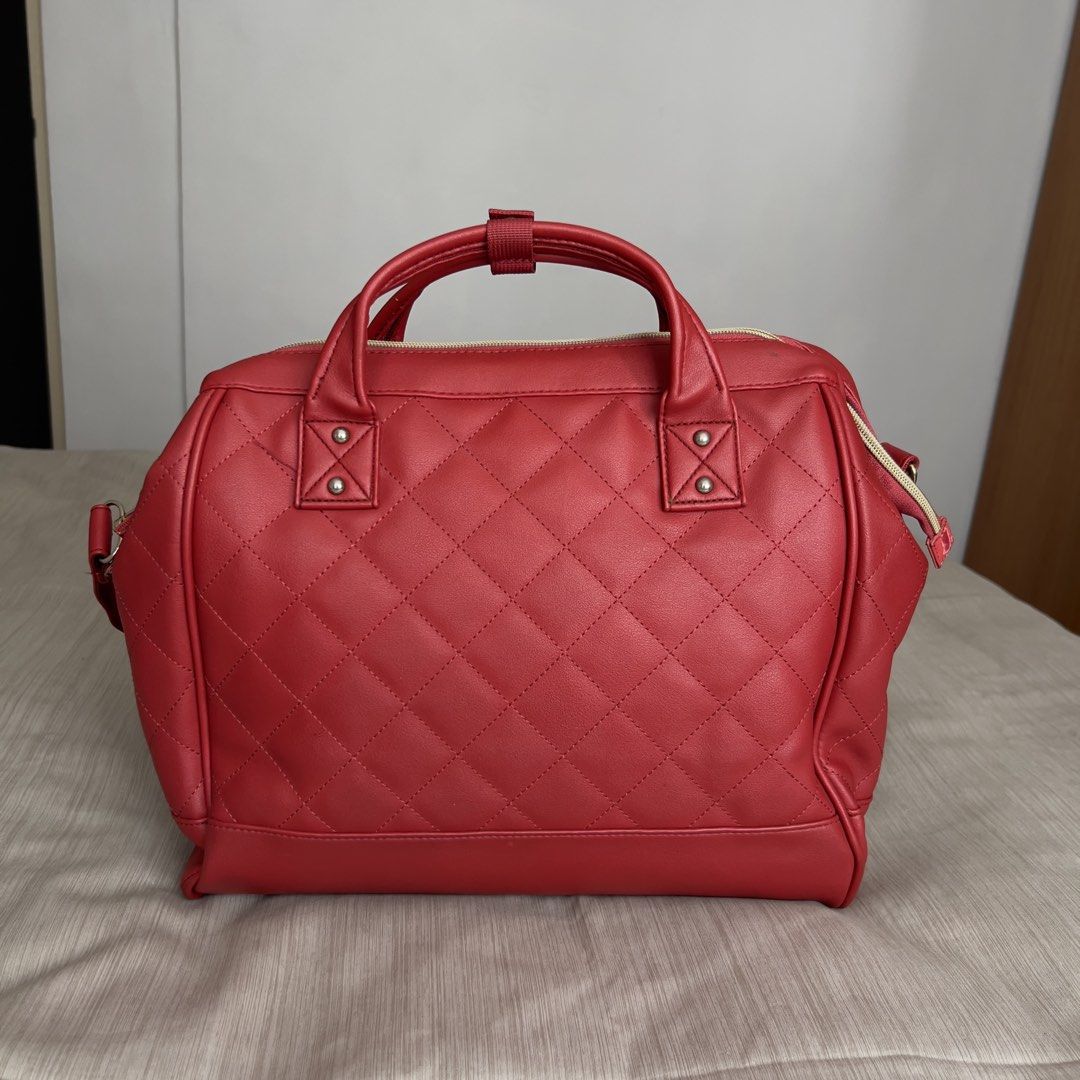 ANELLO 2-Way Boston Quilted Red Shoulder Bag (Category: Shoulder Bags) located in Pasig City. Submitted by jenscloset86 (Listing ID 1465414031, Image 2). Description: Brand: ANELLO • Vibrant red faux leather with gold-tone hardware. • Overall is excellent condition with some wear and tear as shown in photos. • Clean interior and exterior, well-maintained. Measurement (in inches): Height: 11.5” Length: 17” Bottom width: 5”.