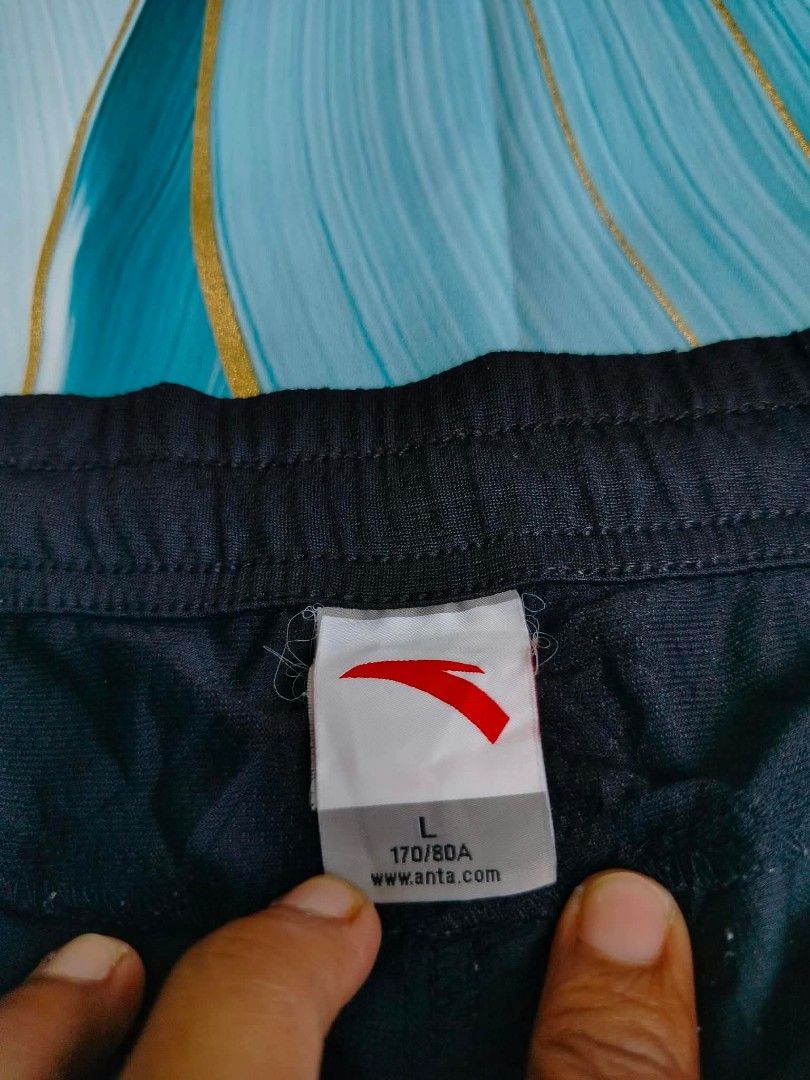 Anta Running Shorts Black Size L (Category: Shorts) located in Manila. Submitted by virgiliosa38485 (Listing ID 1465500607, Image 3). Description: - Brand: Anta - Color: Classic Black - Size: L (170/80A) -Waist 32-40 -Length 16 - Material: Breathable athletic fabric for maximum comfort - Features: Elastic waistband with branded drawstring and two convenient side pockets - Design: Subtle Anta logo printed near the left hem - Condition: Good overal