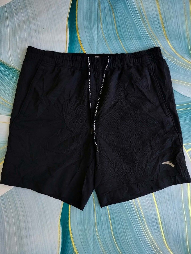 Anta Running Shorts Black Size L (Category: Shorts) located in Manila. Submitted by virgiliosa38485 (Listing ID 1465500607, Image 1). Description: - Brand: Anta - Color: Classic Black - Size: L (170/80A) -Waist 32-40 -Length 16 - Material: Breathable athletic fabric for maximum comfort - Features: Elastic waistband with branded drawstring and two convenient side pockets - Design: Subtle Anta logo printed near the left hem - Condition: Good overal
