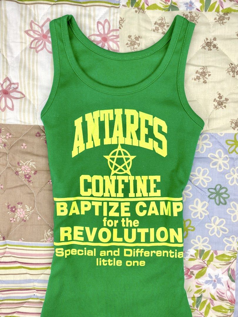 Antares Graphic Slogan Tank Top (Category: Sleeveless) located in Angeles City. Submitted by fruits.ph (Listing ID 1465441751, Image 2). Description: Measurements B:12” W:12” L:22” Size on Tag: ❌ Best Fit: S-M *Flat lay measurements* Mannequin Size: M (34”; 25”) Color Rate: 10/10 Flaws: None Fabric Type: Cotton/ Stretchable Fabric ***Color may vary due to lighting. This item is properly washed and disinfected.***.