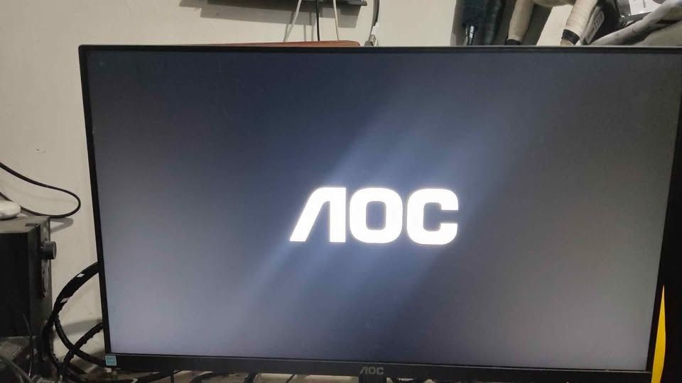 AOC Computer Monitor Display Screen (Category: Monitor Screens) located in Quezon City. Submitted by jeysell (Listing ID 1465518439, Image 1). Description: - Brand: Monitor 24B1XHS 23.8 inch - Condition: Fully working and tested, displays brand logo clearly upon startup - Design: Sleek matte black bezel with thin borders and a sturdy V-shaped stand - Display: Standard widescreen format with a clean surface and minimal glare - Connectivity: Standa