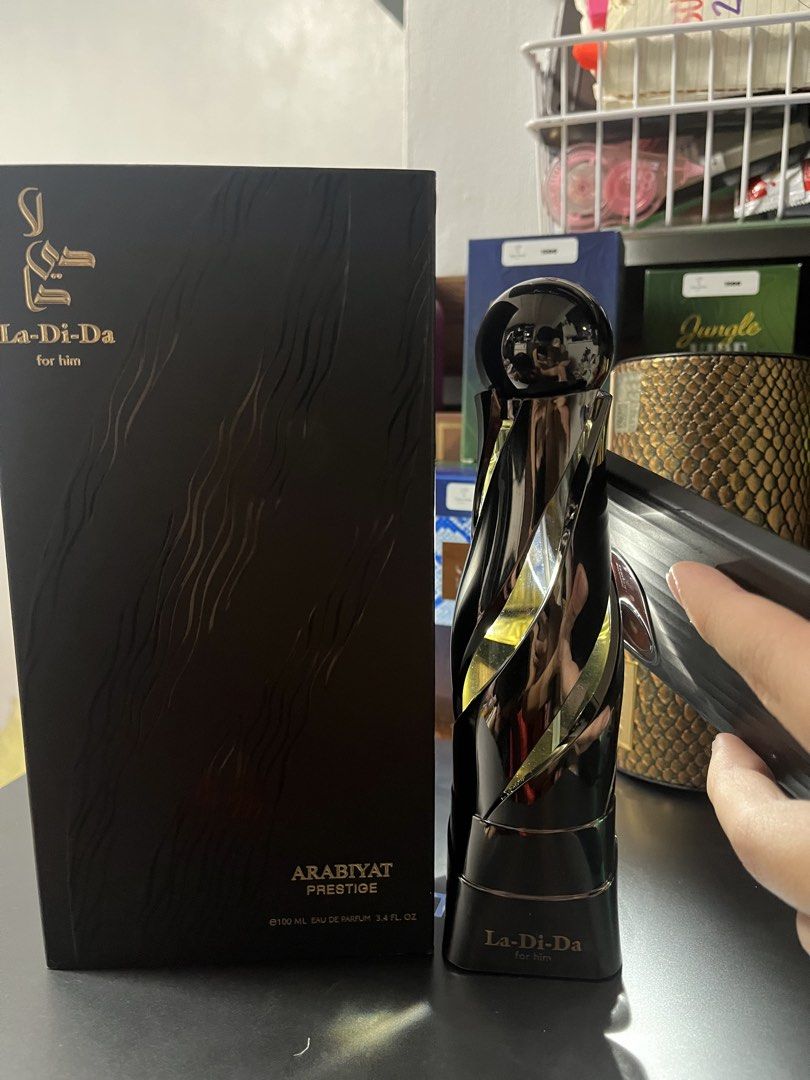 Arabiyat Prestige La-Di-Da for Him EDP (Category: Fragrance & Deodorants) located in Paranaque City. Submitted by generalarene (Listing ID 1465460332, Image 2). Description: Around 50ml remaining Full presentation.