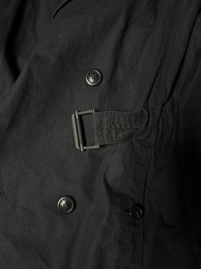 Armani Exchange Black Trench Coat Size M (Category: Coats, Jackets and Outerwear) located in Manila. Submitted by seangoart (Listing ID 1465502733, Image 3). Description: Armani Exchange double-breasted trench coat in solid black. Medium size, made in Vietnam. Features classic lapels, front button closure, and an adjustable waist belt with metal buckle hardware. Durable fabric construction with lined interior. Great outer layer for transitional w