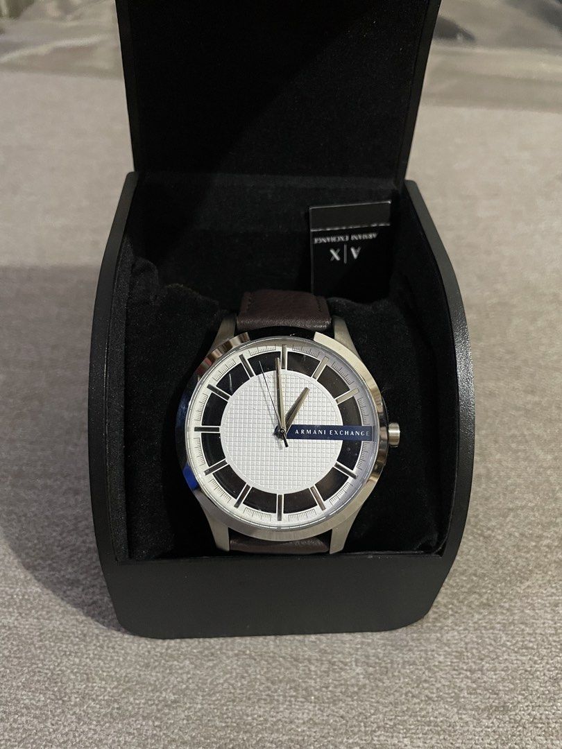 Armani Exchange Men's Watch with Brown Leather Strap (Category: Men's Watches) located in Quezon City. Submitted by nationalgoodtea (Listing ID 1465535635, Image 2). Description: -negotiable for sure buyer -authentic, from 🇺🇸 - Brand: Armani Exchange - Condition: Brand new, never worn, pristine condition - Dial: Textured white dial - Strap: Dark brown genuine leather strap - Case: Durable stainless steel - Inclusions: Original black AX branded 