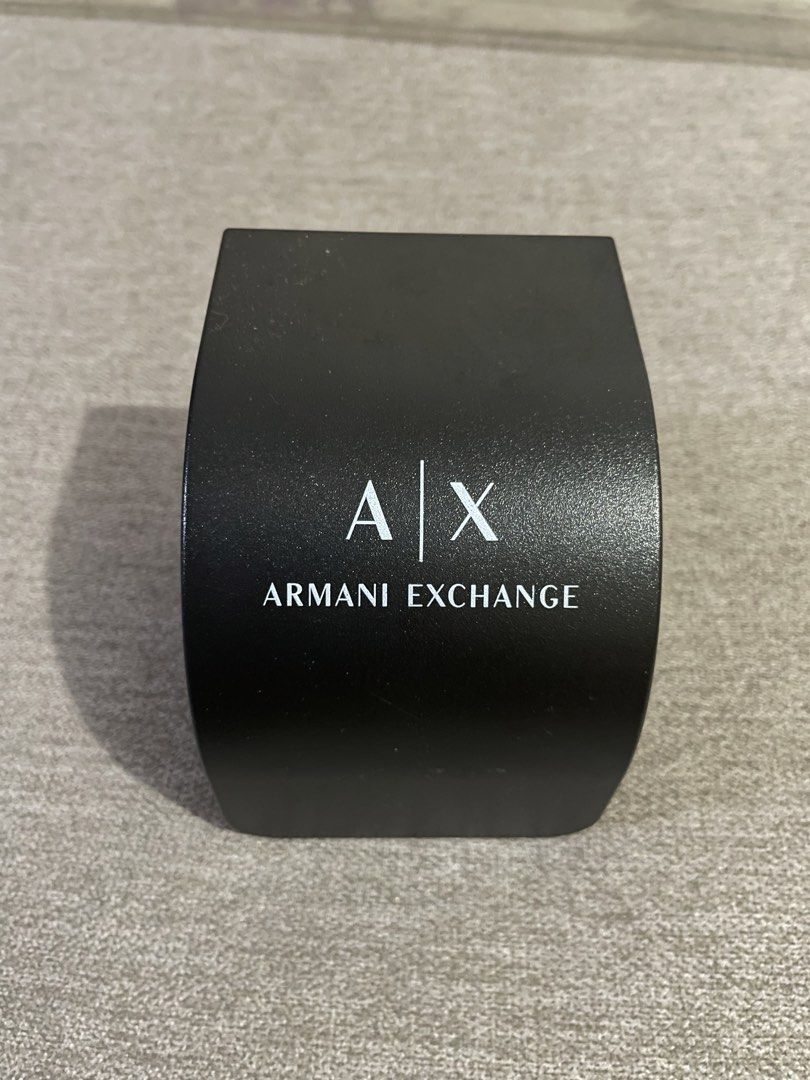Armani Exchange Men's Watch with Brown Leather Strap (Category: Men's Watches) located in Quezon City. Submitted by nationalgoodtea (Listing ID 1465535635, Image 1). Description: -negotiable for sure buyer -authentic, from 🇺🇸 - Brand: Armani Exchange - Condition: Brand new, never worn, pristine condition - Dial: Textured white dial - Strap: Dark brown genuine leather strap - Case: Durable stainless steel - Inclusions: Original black AX branded 