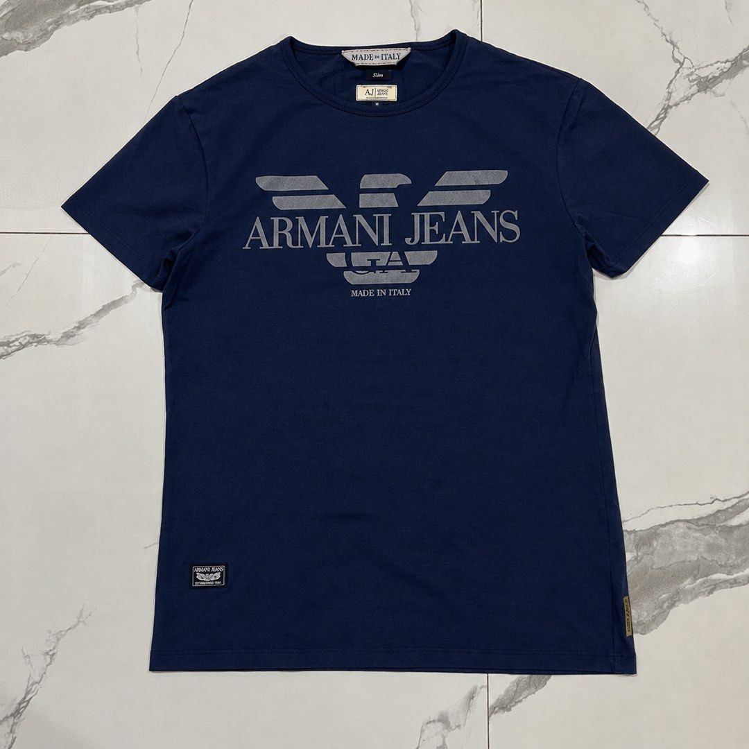 Armani Jeans (Category: Tshirts & Polo Shirts ) located in Bacoor. Submitted by manonghits_2000 (Listing ID 1465541739, Image 1). Description: Armani Jeans Measurement: 19x26 Color: Navy Blue Color Rate: 9.8/10 Condition: Good as New Issue: None Claim 380 .