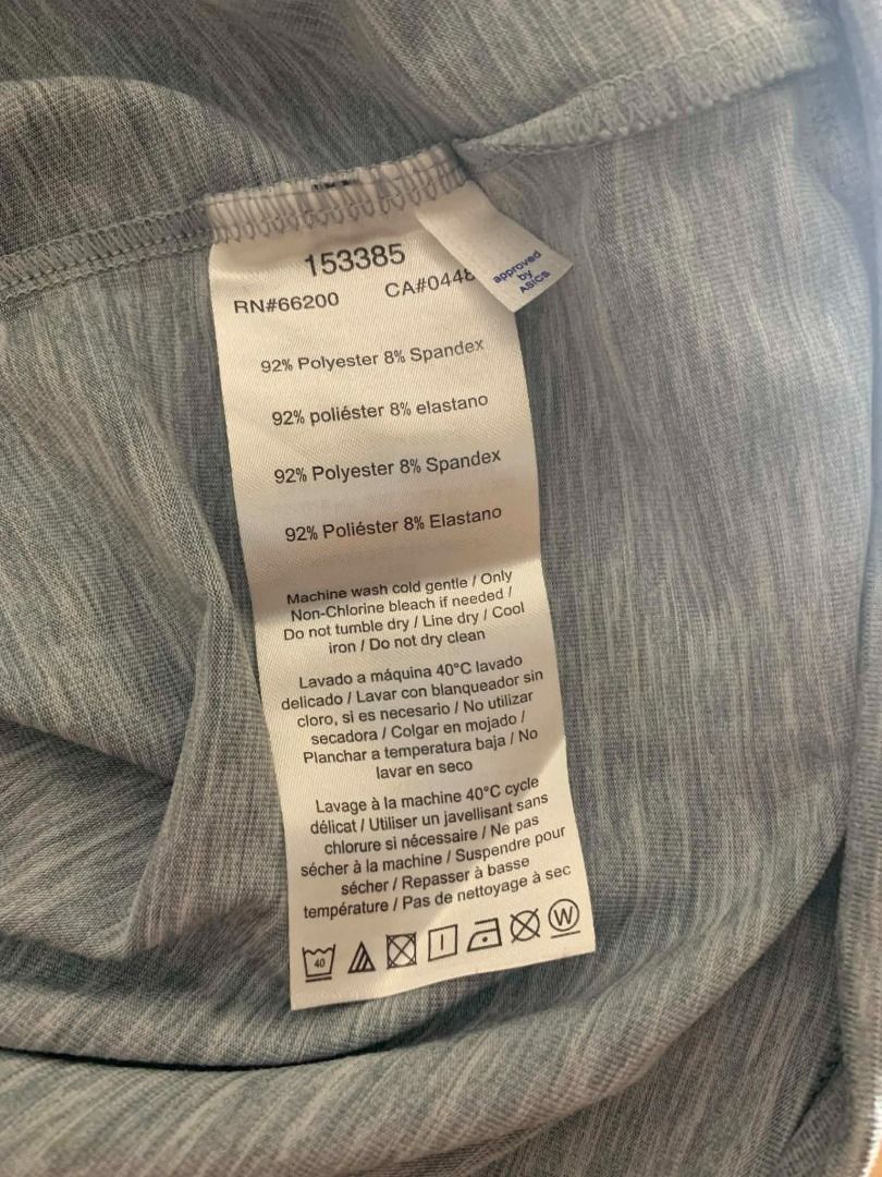 Asics Grey Marled Long Sleeve Activewear Top (Category: Coats, Jackets and Outerwear) located in Manila. Submitted by musedeclutters (Listing ID 1465513105, Image 3). Description: - Brand: Asics - Color: Grey marled - Material: 92% polyester, 8% spandex (lightweight and stretchy) - Features: Long sleeves with thumbholes, subtle logo near hem - Care: Machine washable at 40 degrees - Style Number: 153385 - Washed and properly stored before posting 