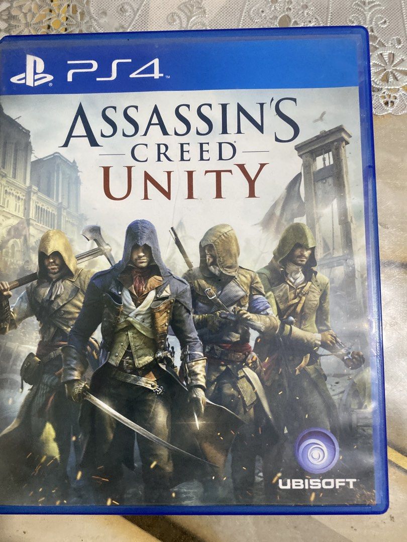 Assassin's Creed Unity PS4 Game (Category: PlayStation) located in Manila. Submitted by skidrow68207402 (Listing ID 1465525300, Image 1). Description: - Game: Assassin's Creed Unity - Platform: PlayStation 4 (PS4) - Setting: Paris 1789, French Revolution - Gameplay: Action-adventure with combat, parkour, stealth, and up to 4-player online co-op - Region: Asia region - Condition: Physical disc with original case included.