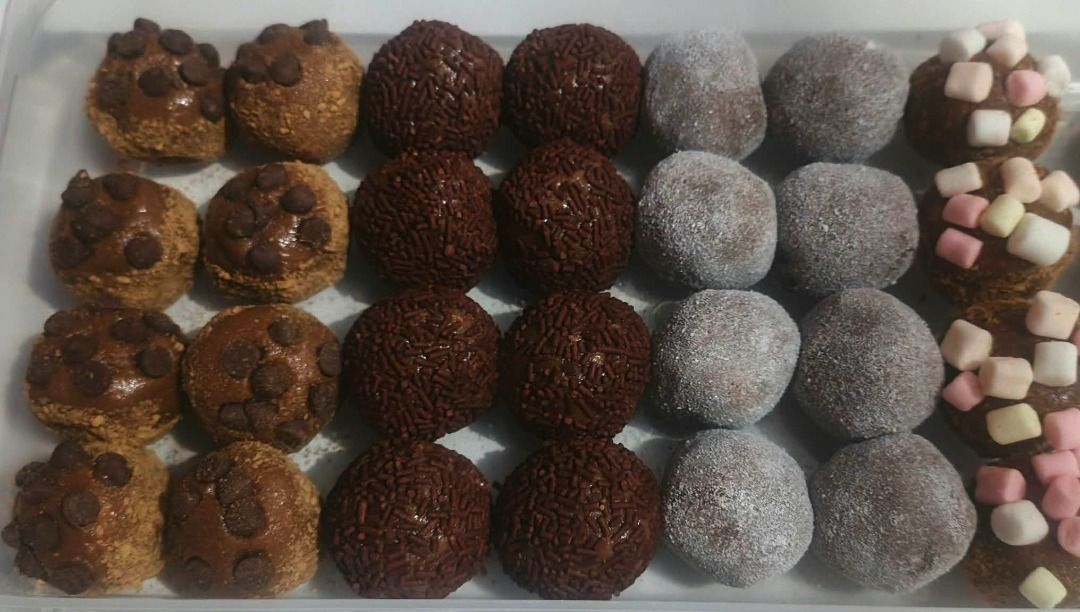 Assorted Chocolate Truffles Box Assorted Toppings (Category: Homemade Bakes) located in Manila. Submitted by swift_maxene4 (Listing ID 1465533611, Image 2). Description: Box of freshly made homemade chocolate truffles featuring a variety of toppings like sprinkles, M&Ms, chocolate chips, crushed biscuits, powdered sugar, and marshmallows. Perfect for sharing, gifting, or treating yourself. Ready to eat!.