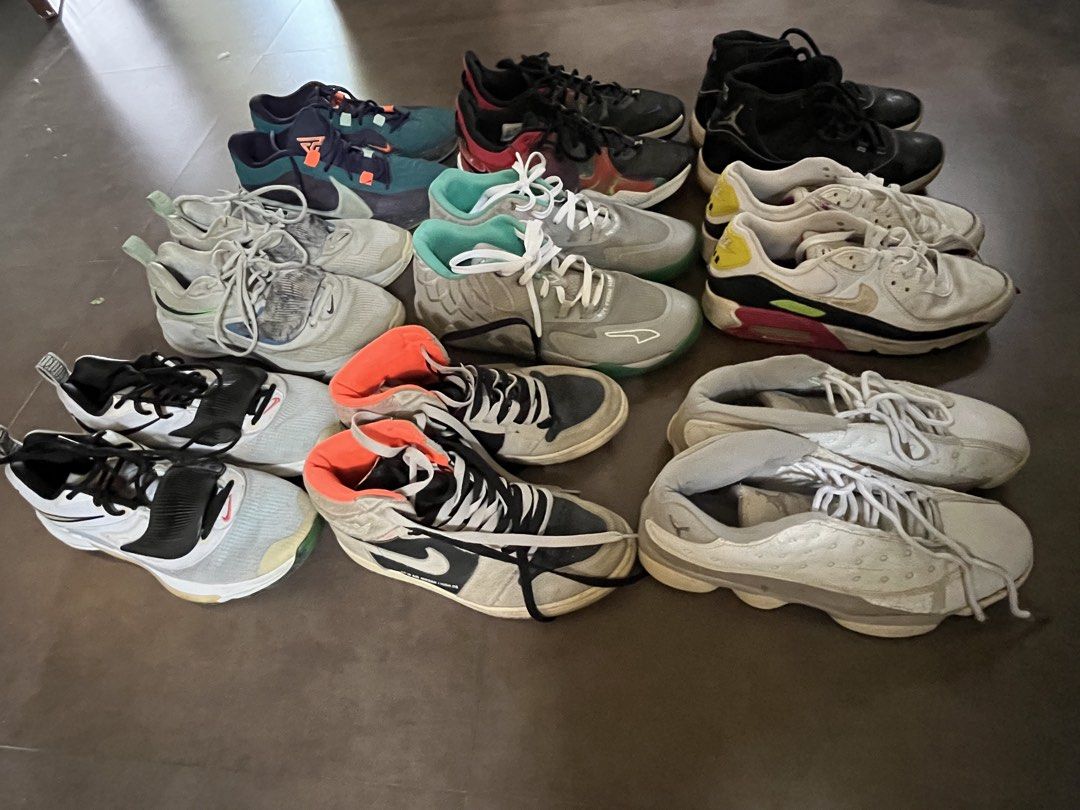 Assorted Sneakers Collection Various Brands and Models (Category: Sneakers) located in Manila. Submitted by tanfinds (Listing ID 1465387871, Image 1). Description: Lot of multiple sneakers including Nike Air Max, Jordan, and other athletic shoes. Various colors like black, white, grey, and teal. Different styles with laces and straps. Pairs shown in the pictures. Great opportunity to grab multiple kicks at once. Grab them before they are gone..