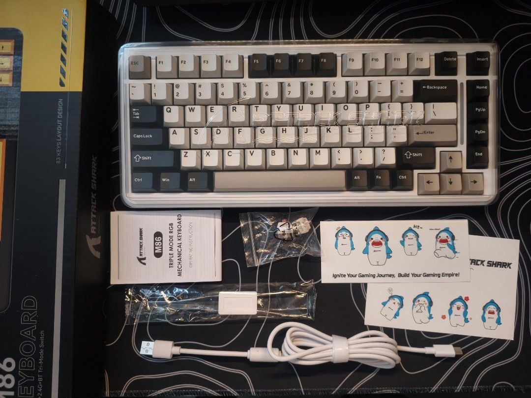 Attack Shark M86 (Tri-Mode) (Category: Computer Keyboard) located in Manila. Submitted by clicknflip_ph (Listing ID 1465481000, Image 3). Description: Condition: Brand New RFS: Resell / Buy and Sell ​Highlights & Specs ✅​3-Mode Connectivity: Bluetooth 5.0, 2.4GHz Wireless (Dongle included), and Type-C Wired ✅Blueberry Axis Switch ​Package Inclusions: ✅Brand New Attack Shark M86 Keyboard with acrylic dust cover​✅Original Box, Manual, and Sticker P
