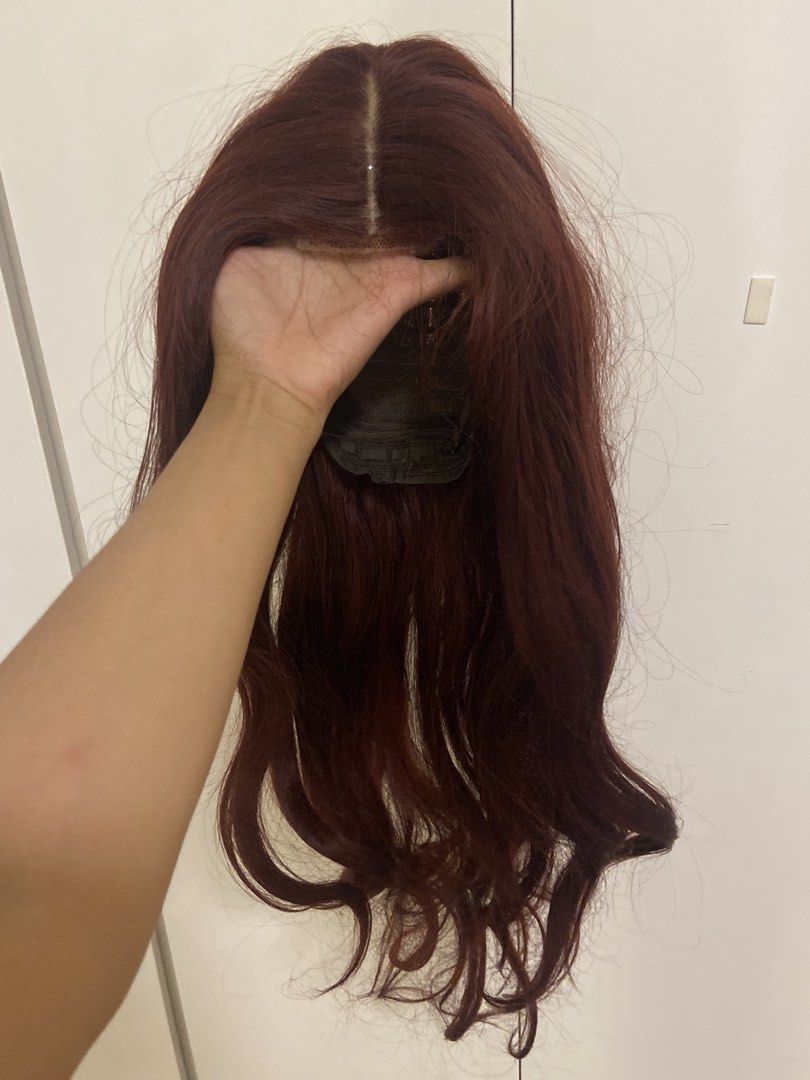 Auburn Red Wavy Lace Part Wig (Category: Hair Accessories) located in Manila. Submitted by charleneka32549 (Listing ID 1465437790, Image 3). Description: Auburn red synthetic wig with long wavy ends and soft curls. Features a lace part at the top for a natural scalp look. Inner mesh cap is adjustable and lightweight. Easy to wear for everyday styles or costume parties..