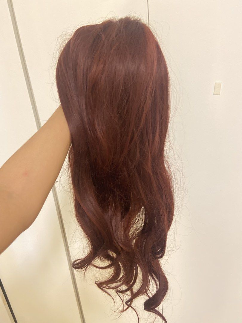 Auburn Red Wavy Lace Part Wig (Category: Hair Accessories) located in Manila. Submitted by charleneka32549 (Listing ID 1465437790, Image 1). Description: Auburn red synthetic wig with long wavy ends and soft curls. Features a lace part at the top for a natural scalp look. Inner mesh cap is adjustable and lightweight. Easy to wear for everyday styles or costume parties..