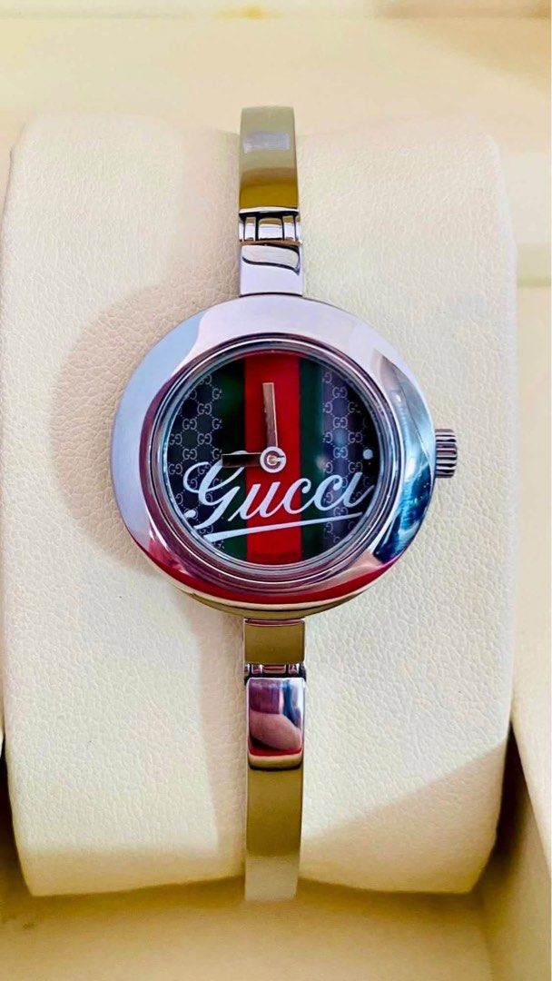 Auth G.U.C.C.I 105 Bangle Watch for Ladie’s (Category: Women's Watches) located in San Fernando. Submitted by rujaywatches (Listing ID 1465495087, Image 2). Description: Auth G.U.C.C.I 105 Bangle Watch for Ladie’s -CherryLine Dial -Sapphire Glass -Swiss Made -Stainless Steel -For Medium Wrist Size -With Provided Box -In Excellent Condition 📌Disclaimer:📌 I Claim to be a Legit Watch Reseller. All Products, Names, Brands, and Logos are owned by th