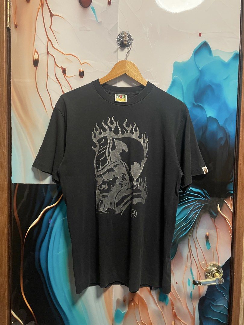 AUTHENTIC A Bathing Ape Flame Ape Head Graphic T-Shirt (Category: Tshirts & Polo Shirts ) located in Davao. Submitted by loythrift30 (Listing ID 1465524814, Image 1). Description: - Brand: A Bathing Ape (BAPE) - Color: Black - Size: Medium (M) - Material: 100% Cotton - Origin: Made in Japan - Design: Large silver flaming ape head graphic on front, small back collar branding.