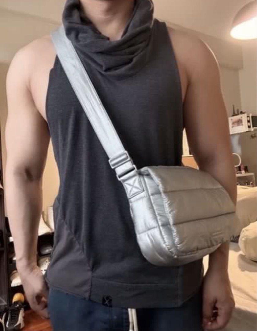 Authentic Beyond The Vines Metallic Poofy Bag (Category: Cross-body Bags) located in Mandaluyong City. Submitted by wear_your_style (Listing ID 1463720160, Image 3). Description: Store bought for ₱4,800 i think. This is a limited edition bag (Holiday). It’s metallic silver but it’s not the cheap metallic finish. Parang matte finish ganun and it doesn’t chip off. Nylon base material. Adjustable strap pero at max nasa bewang ko lang yung bag (im 5’