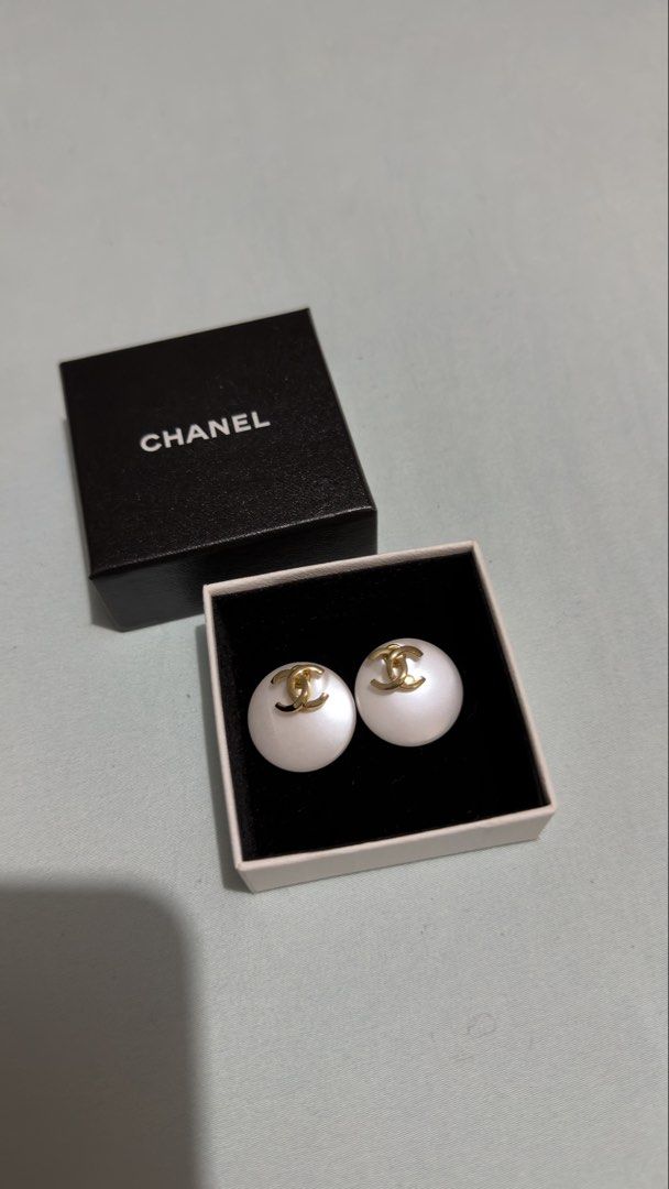 Authentic Chanel Earrings (Category: Earrings) located in Angat. Submitted by shopmyclosetbykris (Listing ID 1464848376, Image 1). Description: Purchased from Japan Condition: Like new, no any flaw to mention Used once only With box Will send more actual photos upon request Guranteed Auth, has chanel serial markings at the back 15,000! LP posted! Location: Baliwag Bulacan Meet ups within Bulacan .
