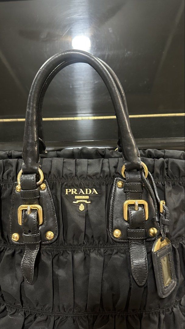 Authentic Prada Black Gaufre Large (Category: Luxury Bags & Wallets) located in Las Pinas. Submitted by marshmallowmax (Listing ID 1465393961, Image 2). Description: Guaranteed Authentic! Normal signs of usage only .