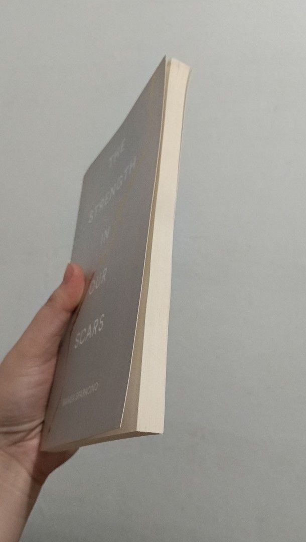 [Authentic] The Strength in Our Scars by Bianca Sparacino (Category: Storybooks) located in Quezon City. Submitted by cclazo1029 (Listing ID 1465530748, Image 3). Description: - Title: The Strength in Our Scars by Bianca Sparacino - Condition: Clean pages with minimal shelf wear on corners - Genre: Poetry and prose for reflection and healing DM for more photos or inquiries. Shipping on weekends only. .