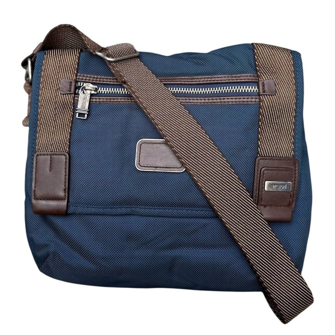 Authentic TUMI (Category: Sling Bags) located in San Fabian. Submitted by rei_aniels (Listing ID 1465418154, Image 1). Description: TUMI Like new No flaws Sling Bag Adjustable Strap .