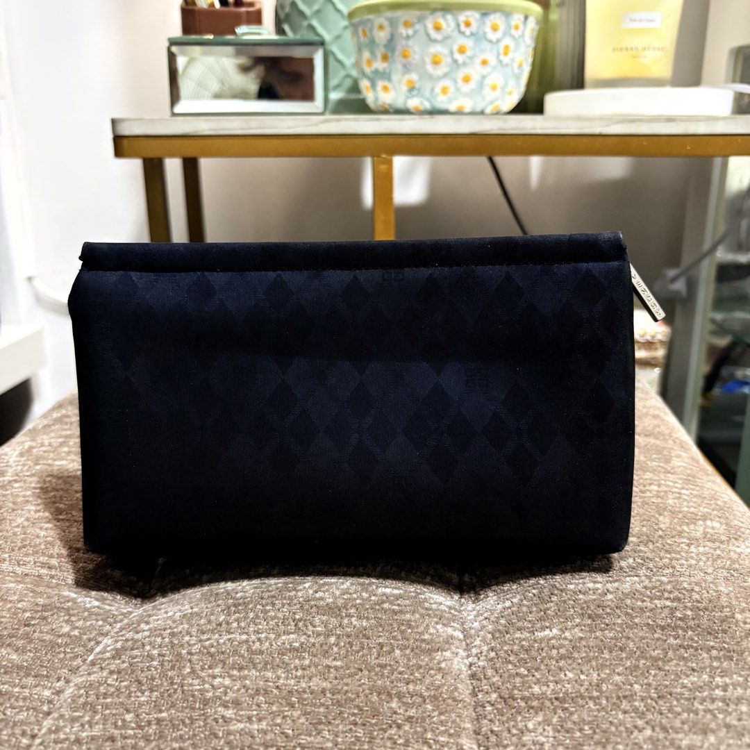 Authentic Vintage Givenchy Rhinestones Black Cosmetic Pouch (Category: Purses & Pouches) located in Binangonan. Submitted by makoleksyon (Listing ID 1465398462, Image 3). Description: Excellent condition Like new No flaws Size: H-5 x W-8 x D-1.5 inches Bought in Japan 💯% Authentic Money back guarantee .