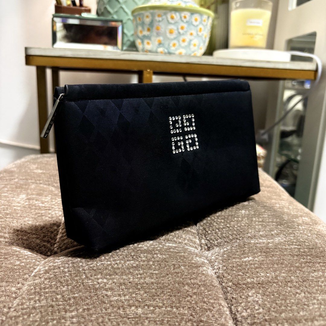 Authentic Vintage Givenchy Rhinestones Black Cosmetic Pouch (Category: Purses & Pouches) located in Binangonan. Submitted by makoleksyon (Listing ID 1465398462, Image 2). Description: Excellent condition Like new No flaws Size: H-5 x W-8 x D-1.5 inches Bought in Japan 💯% Authentic Money back guarantee .