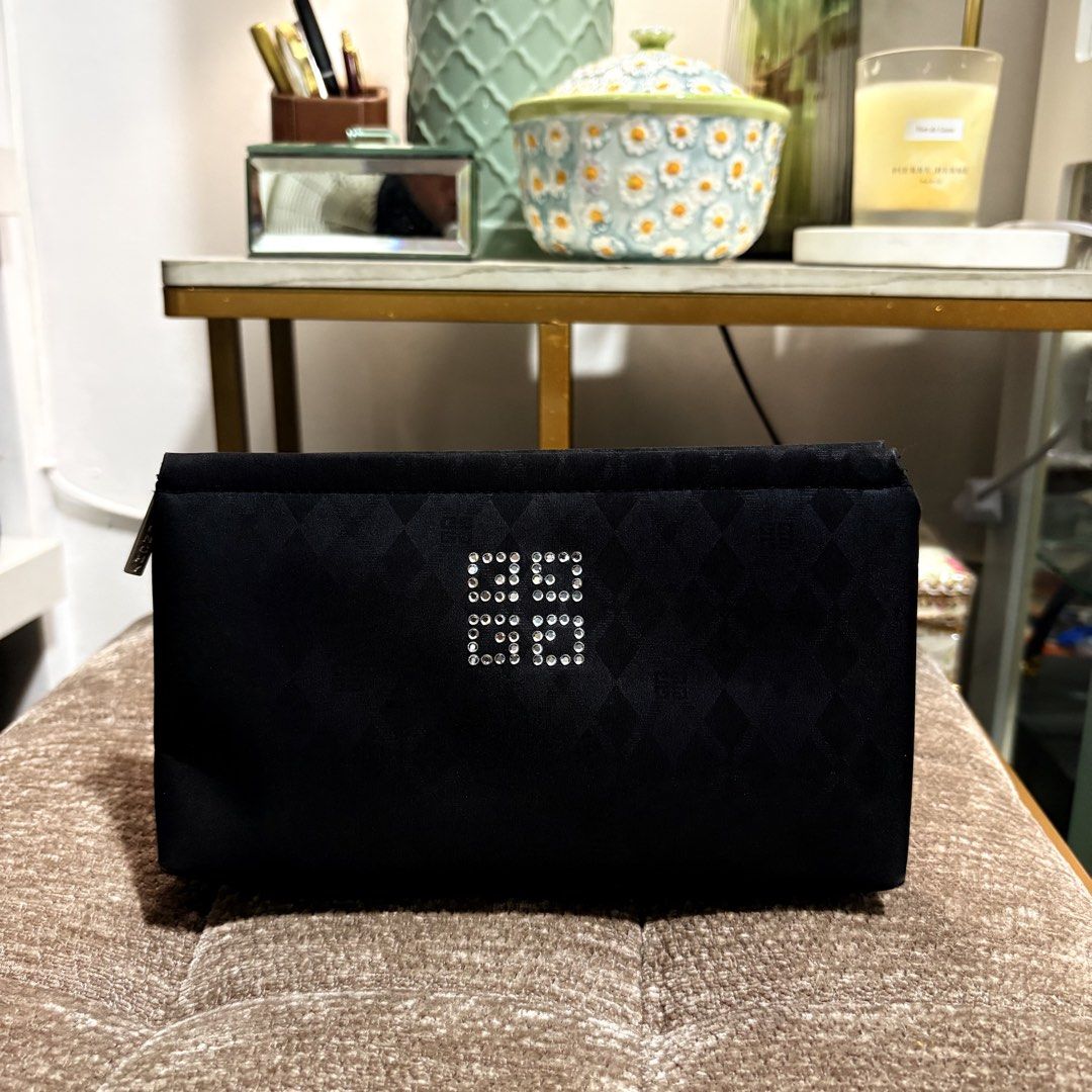 Authentic Vintage Givenchy Rhinestones Black Cosmetic Pouch (Category: Purses & Pouches) located in Binangonan. Submitted by makoleksyon (Listing ID 1465398462, Image 1). Description: Excellent condition Like new No flaws Size: H-5 x W-8 x D-1.5 inches Bought in Japan 💯% Authentic Money back guarantee .