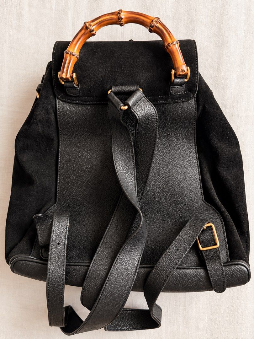 Authentic Vintage Gucci Bamboo Suede Backpack – Black (Category: Luxury Bags & Wallets) located in Makati City. Submitted by thecloset.edit.ph (Listing ID 1465416270, Image 3). Description: A beautiful vintage Gucci piece featuring the house’s iconic bamboo detailing. Crafted in black suede with leather trims, gold-tone hardware, and a structured bamboo top handle. This is the larger backpack style with two front pockets and bamboo accents — a cl