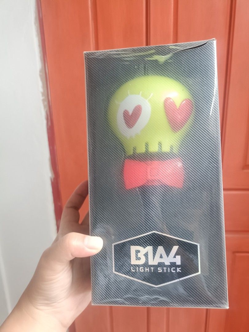 B1A4 Official Light Stick in Box (Category: K-Wave Merchandise) located in Baguio. Submitted by jamela.joy.shoppe15 (Listing ID 1465449725, Image 1). Description: - NOT WORKING FOR DISPLAY PURPOSES ONLY ‼️ - Iconic green skull head design with heart eyes and red bow tie - Authentic merchandise with official WM Entertainment and Rainbow Bus branding - Perfect for collectors .